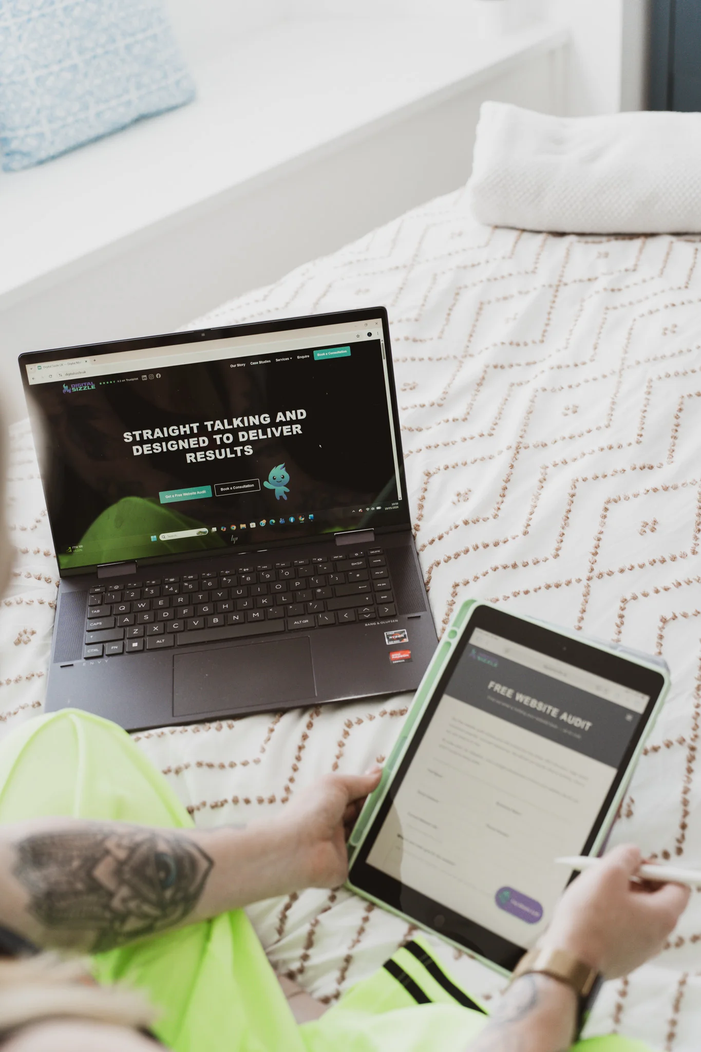 Multiple devices displaying Digital Sizzle client websites across desktop, tablet and mobile